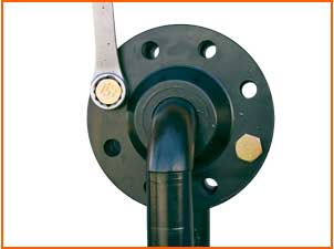 If necessary, use a second tool and turn until the bolt holes are in alignment and insert flange bolts.